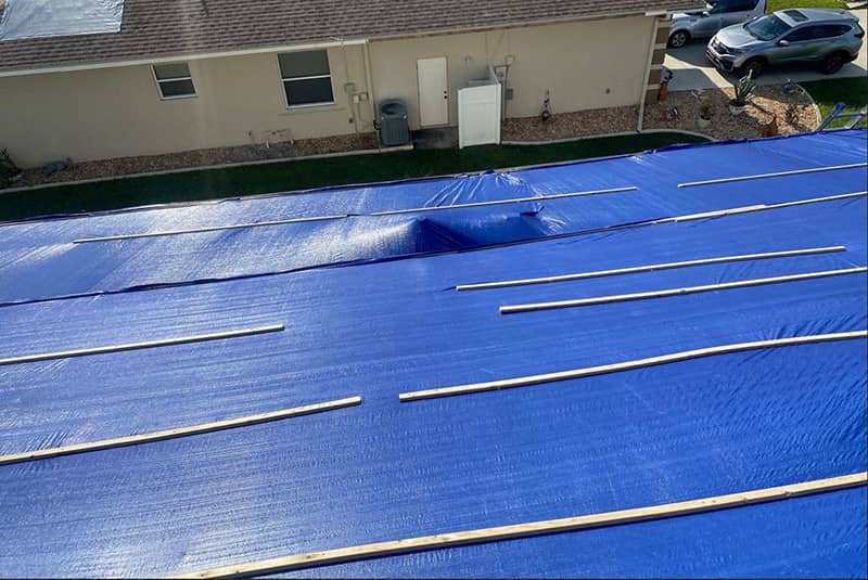 Emergency Roof Tarping by Cat 6 Roofing
